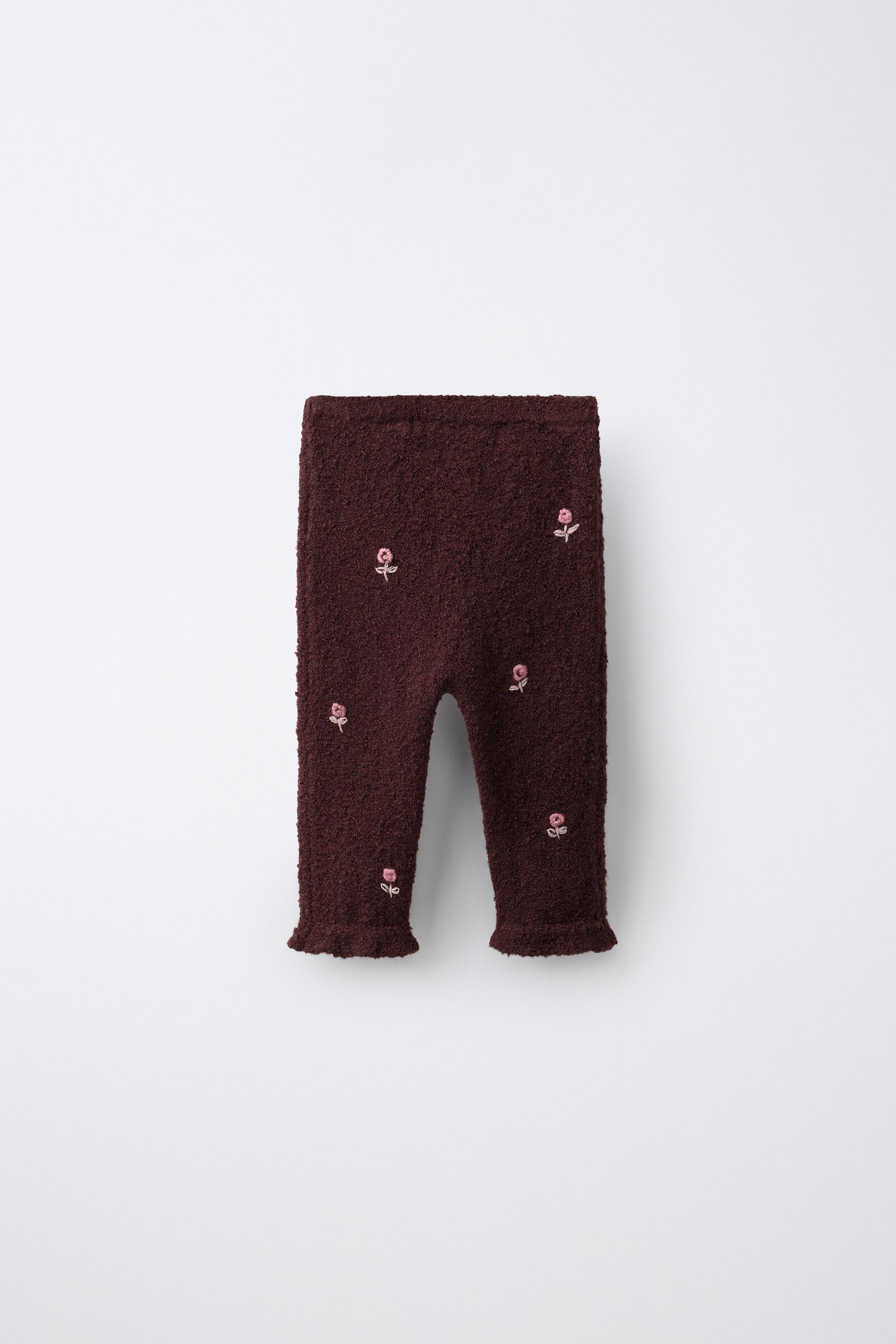 KNIT PANTS WITH RUFFLE HEM AND DOT DETAIL